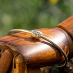 Stirling silver bangle with solid silver bead